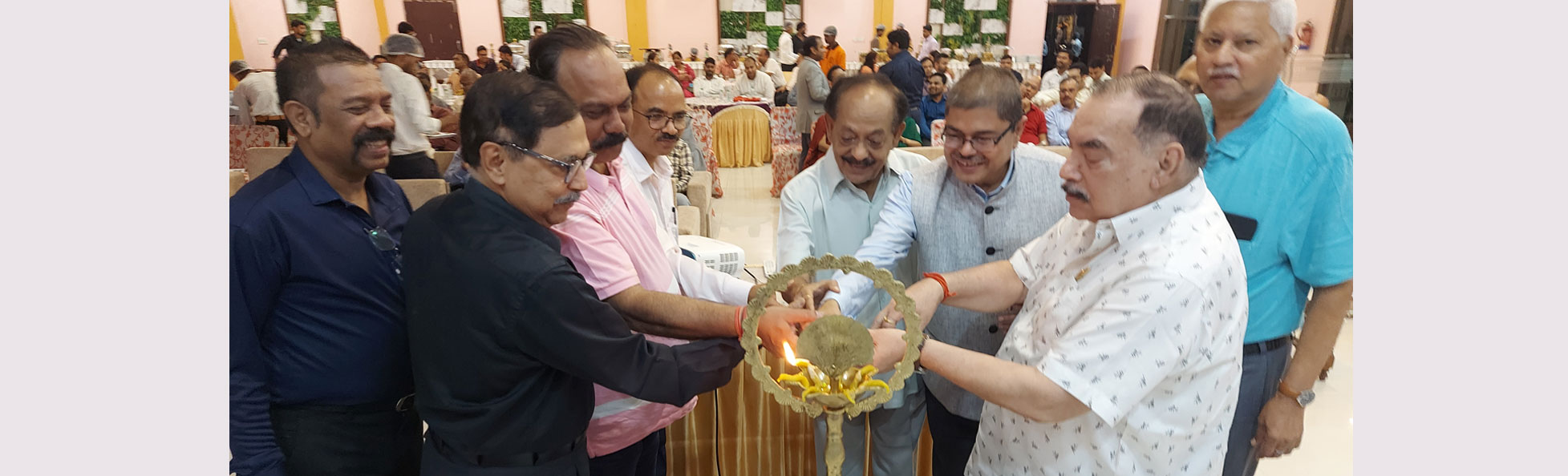 Eminent professionals illuminating the ceremonial lamp at the inaugural ceremony