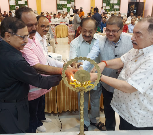 Eminent professionals illuminating the ceremonial lamp at the inaugural ceremony